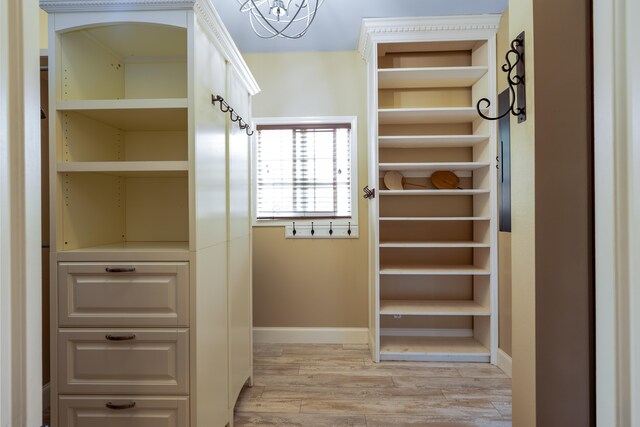 71-1861 Puu Lani Loop, Kailua-Kona, HI 96740 - spacious closet with light wood-type flooring and a chandelier