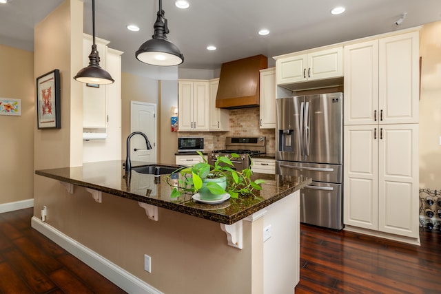 71-1861 Puu Lani Loop, Kailua-Kona, HI 96740 - kitchen with appliances with stainless steel finishes, custom range hood, a peninsula, dark wood-style flooring, and recessed lighting