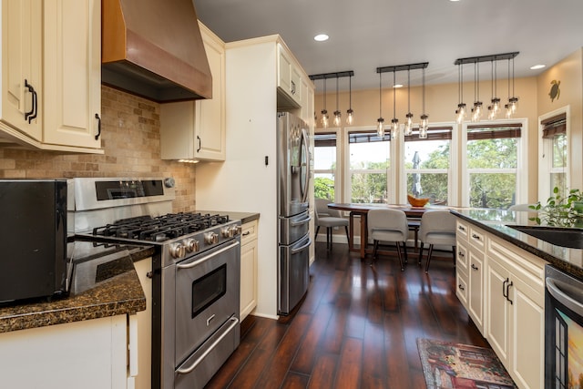 71-1861 Puu Lani Loop, Kailua-Kona, HI 96740 - kitchen featuring stainless steel appliances, wall chimney exhaust hood, tasteful backsplash, decorative light fixtures, and recessed lighting