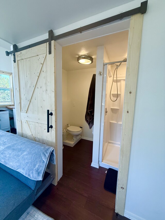 94 Pele St, Naalehu, HI 96772 - bathroom featuring wood finished floors and a stall shower