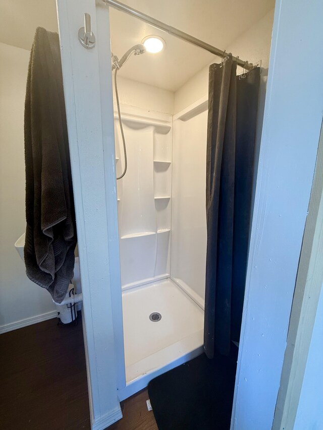 94 Pele St, Naalehu, HI 96772 - full bath with a shower stall and wood finished floors