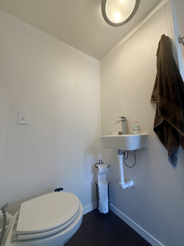 94 Pele St, Naalehu, HI 96772 - bathroom with a sink and wood finished floors