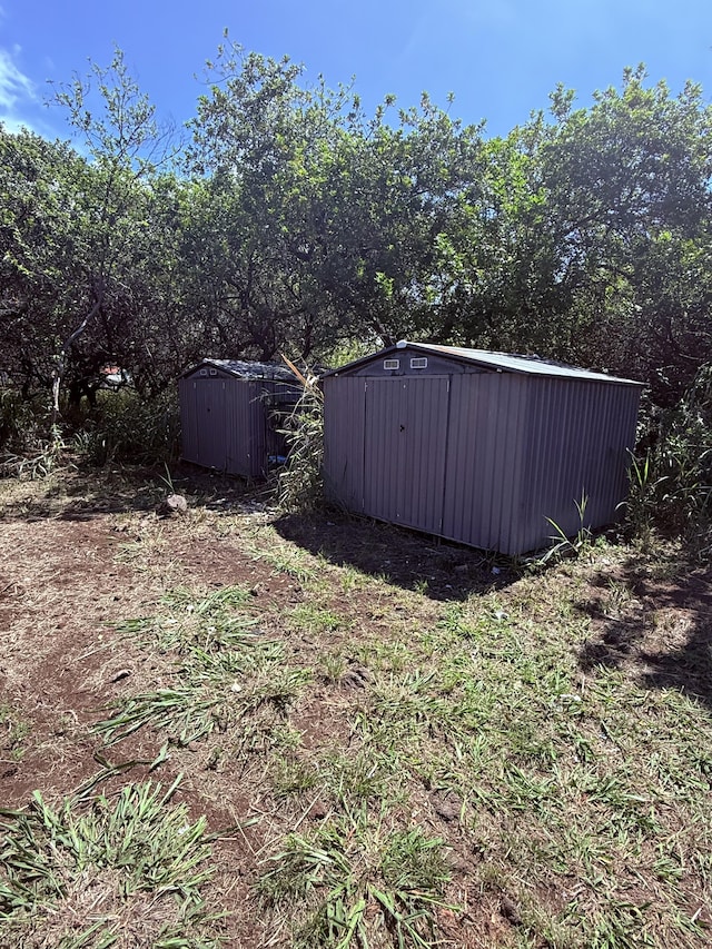94 Pele St, Naalehu, HI 96772 - view of yard featuring a shed