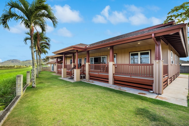 3238 Unahe St, Lihue, HI 96766 - view of front of property with roof with shingles, a front lawn, and covered porch
