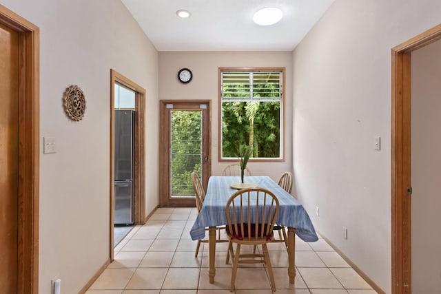 1436 Maikalani St, Hilo, HI 96720 - dining room featuring light tile patterned floors and baseboards