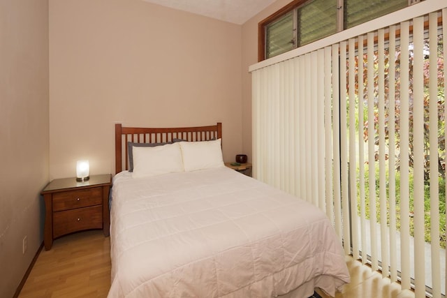 1436 Maikalani St, Hilo, HI 96720 - bedroom with wood finished floors and baseboards