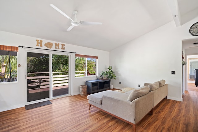 6100 Kawaihau Rd, Kapaa, HI 96746 - living room featuring vaulted ceiling, wood finished floors, and a ceiling fan