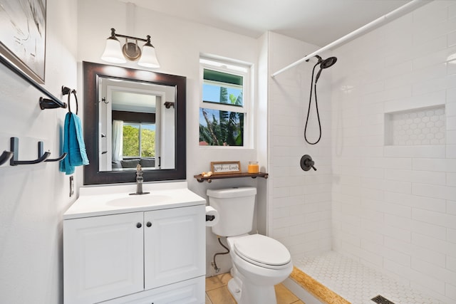 6100 Kawaihau Rd, Kapaa, HI 96746 - bathroom featuring vanity, a tile shower, and tile patterned floors
