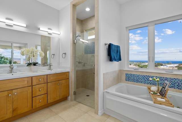 68-3543 Aaka Pl, Waikoloa, HI 96738 - full bath featuring a garden tub, a shower stall, double vanity, and tile patterned flooring