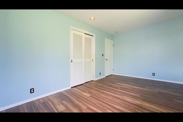 15-2811 Manalo St, Pahoa, HI 96778 - unfurnished bedroom with wood finished floors, a closet, and recessed lighting