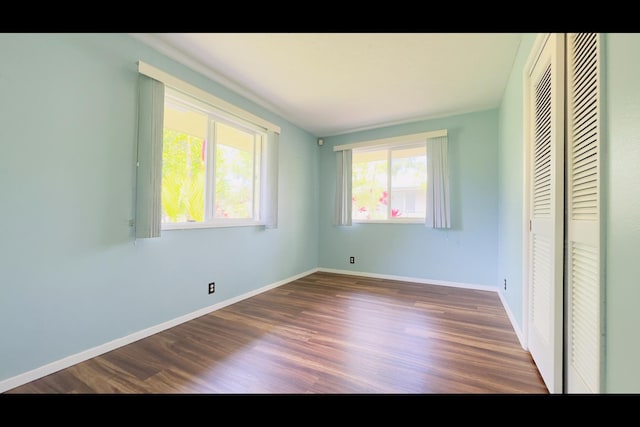 15-2811 Manalo St, Pahoa, HI 96778 - unfurnished bedroom featuring a closet and dark wood finished floors