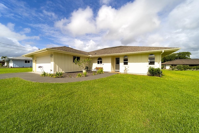 321 Noelani Loop, Hilo, HI 96720 - view of front of property featuring driveway, a front lawn, an attached garage, and a shingled roof