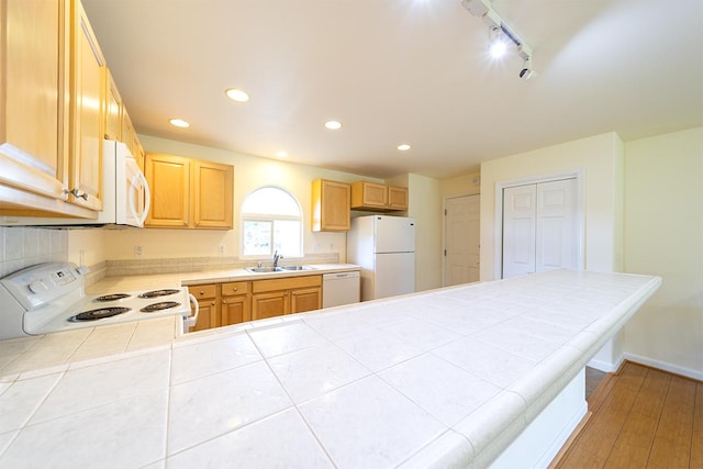 321 Noelani Loop, Hilo, HI 96720 - kitchen featuring white appliances, tile counters, rail lighting, a peninsula, and recessed lighting