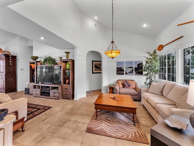59-380 Olomana Rd, Kamuela, HI 96743 - living room featuring high vaulted ceiling, arched walkways, recessed lighting, and light tile patterned floors