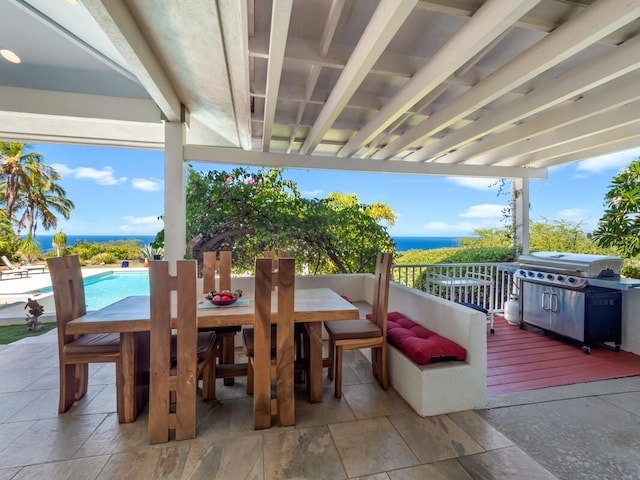 59-380 Olomana Rd, Kamuela, HI 96743 - wooden deck featuring outdoor dining space, a grill, an outdoor pool, and a water view