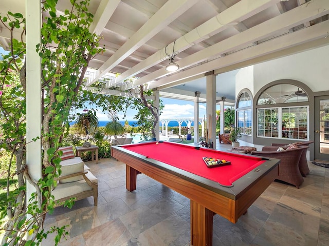 59-380 Olomana Rd, Kamuela, HI 96743 - recreation room with billiards table, stone tile floors, and beam ceiling