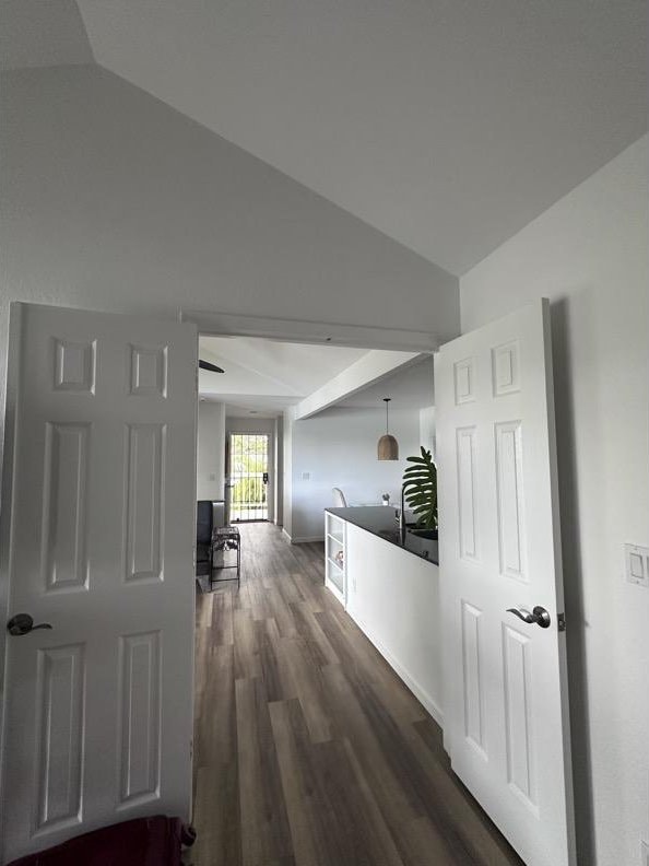 68-3883 Lua Kula St Unit 707, Waikoloa, HI 96738 - corridor featuring lofted ceiling and dark wood-type flooring