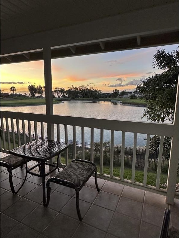 68-3883 Lua Kula St Unit 707, Waikoloa, HI 96738 - balcony at dusk with a water view
