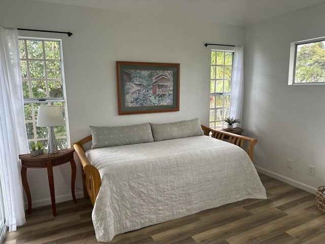 68-3883 Lua Kula St Unit 707, Waikoloa, HI 96738 - bedroom featuring wood finished floors and multiple windows
