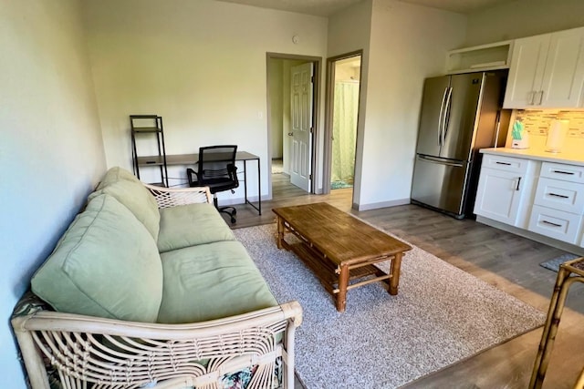 50 Maile St Unit A3, Hilo, HI 96720 - living area with dark wood-style flooring and baseboards