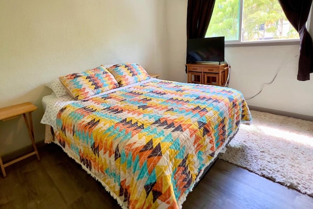 50 Maile St Unit A3, Hilo, HI 96720 - bedroom featuring wood finished floors and baseboards