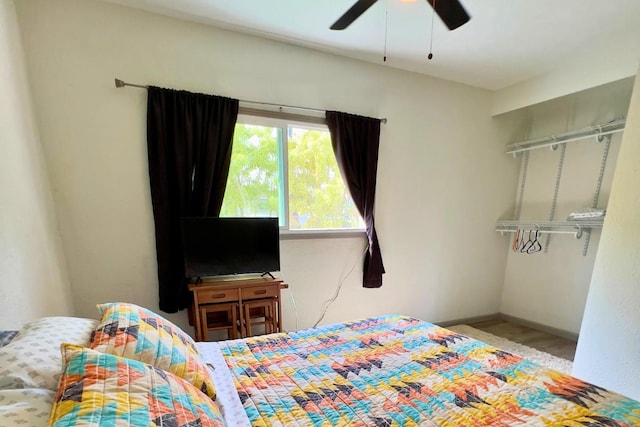 50 Maile St Unit A3, Hilo, HI 96720 - bedroom featuring a ceiling fan and baseboards