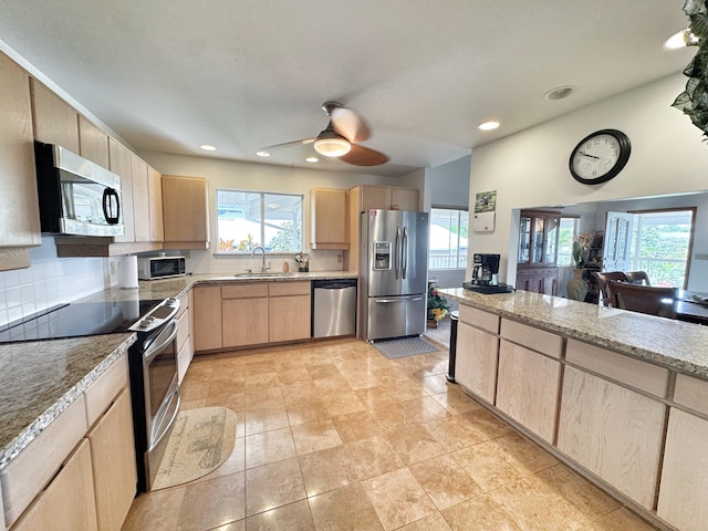 73-1259 Melomelo St, Kailua-Kona, HI 96740 - kitchen with appliances with stainless steel finishes, light brown cabinetry, ceiling fan, light stone countertops, and recessed lighting