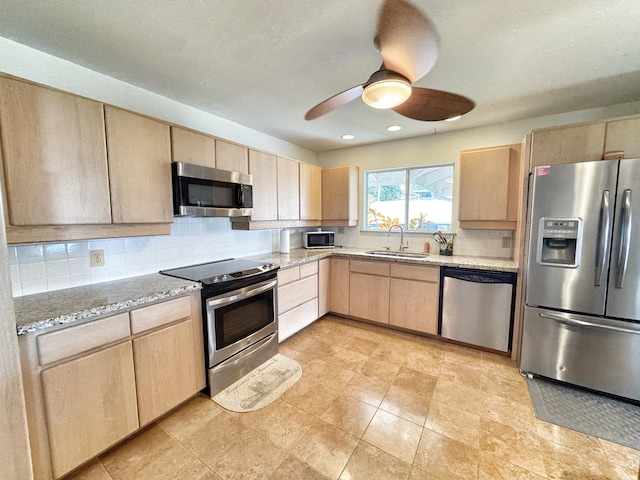 73-1259 Melomelo St, Kailua-Kona, HI 96740 - kitchen featuring appliances with stainless steel finishes, light brown cabinets, tasteful backsplash, a ceiling fan, and light stone counters