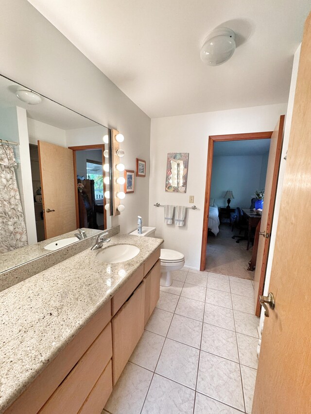 73-1259 Melomelo St, Kailua-Kona, HI 96740 - ensuite bathroom with vanity and tile patterned floors