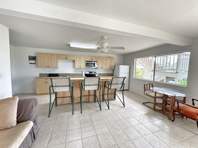 73-1259 Melomelo St, Kailua-Kona, HI 96740 - kitchen featuring stainless steel appliances, light brown cabinets, a breakfast bar, and light tile patterned floors