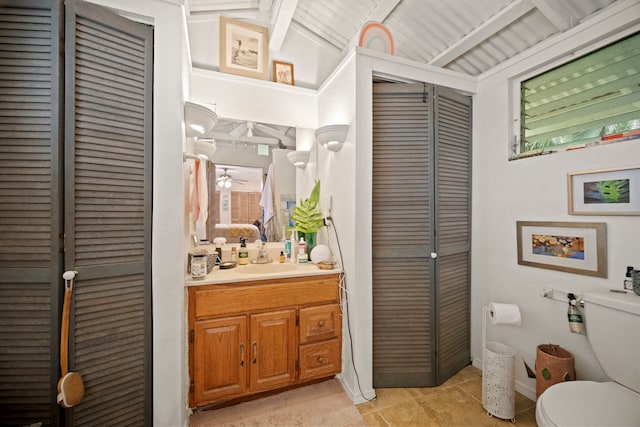 147 Royal Dr, Kapaa, HI 96746 - bathroom featuring a closet, vanity, lofted ceiling, and tile patterned flooring