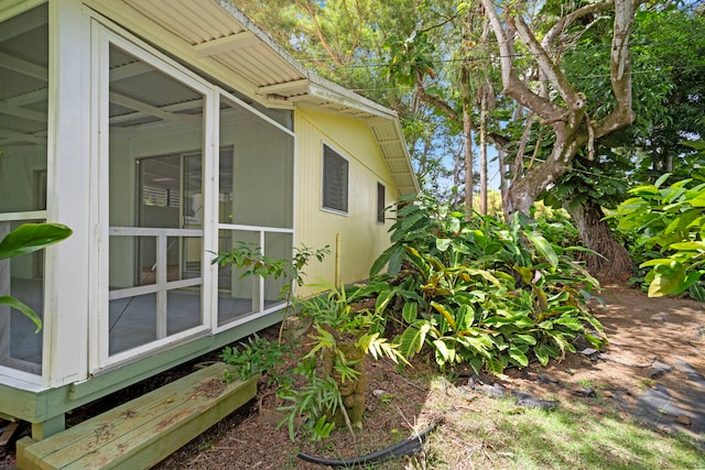 147 Royal Dr, Kapaa, HI 96746 - view of home's exterior featuring a sunroom