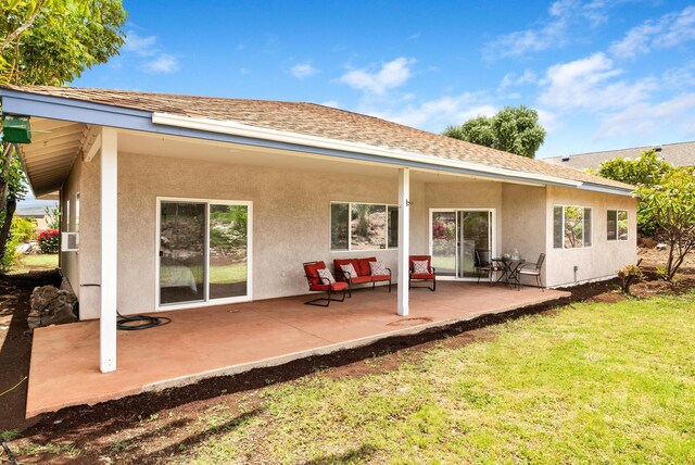 68-1685 Alana St, Waikoloa, HI 96738 - back of property featuring stucco siding, a lawn, a patio, and roof with shingles