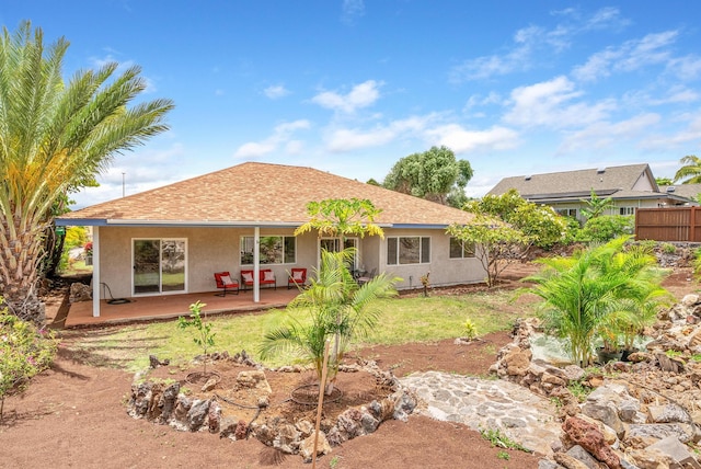 68-1685 Alana St, Waikoloa, HI 96738 - rear view of property featuring stucco siding