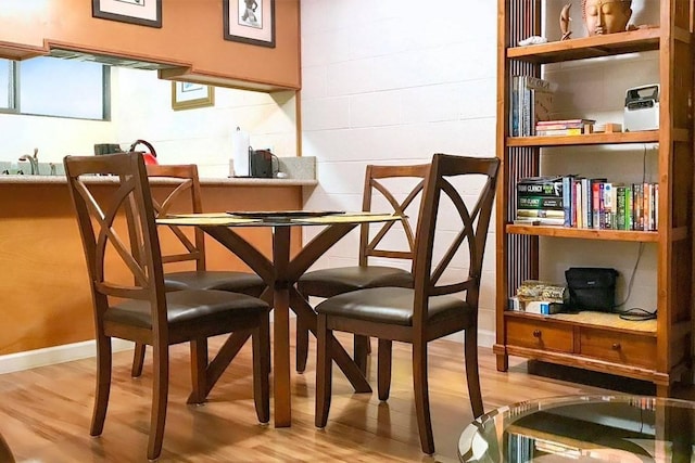 1875 Kalanianaole St Unit 504, Hilo, HI 96720 - dining area with light wood finished floors