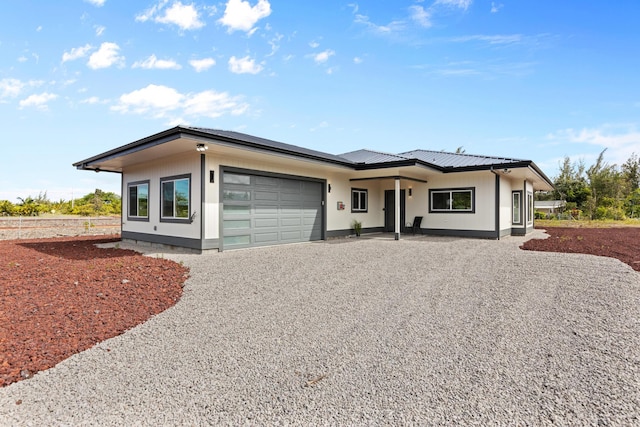 15-1628 Loke Rd, Keaau, HI 96749 - view of front of property featuring gravel driveway and an attached garage