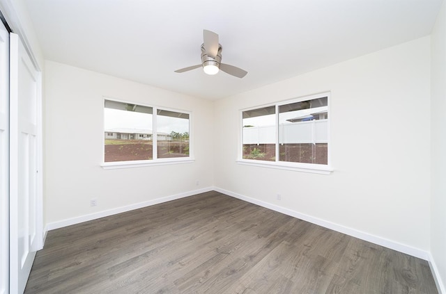 2672 Kuku St, Hilo, HI 96720 - unfurnished bedroom featuring wood finished floors, ceiling fan, and a closet