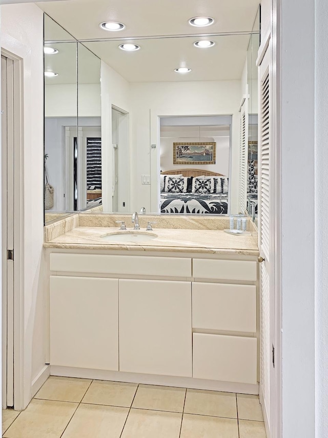 2253 Poipu Rd Unit 28, Koloa, HI 96756 - ensuite bathroom with tile patterned flooring, vanity, and recessed lighting