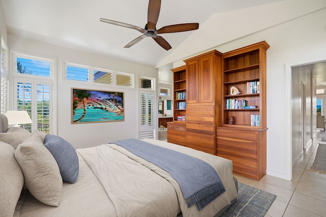 1690 Keleka Rd, Koloa, HI 96756 - bedroom with light tile patterned floors, lofted ceiling, and a ceiling fan
