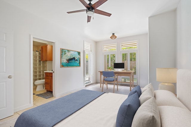 1690 Keleka Rd, Koloa, HI 96756 - bedroom featuring light tile patterned flooring, an office area, ensuite bath, and a ceiling fan