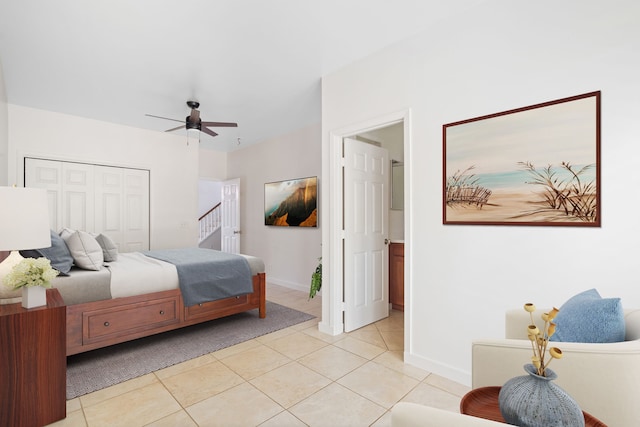 1690 Keleka Rd, Koloa, HI 96756 - bedroom featuring light tile patterned flooring, a closet, and a ceiling fan