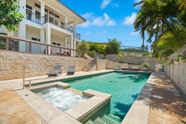1690 Keleka Rd, Koloa, HI 96756 - view of pool featuring stairs, a pool with connected hot tub, a fenced backyard, and a patio