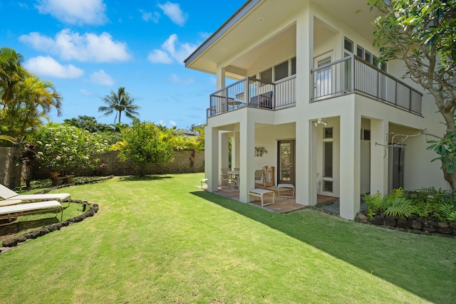 1690 Keleka Rd, Koloa, HI 96756 - rear view of property with a balcony, stucco siding, and a patio