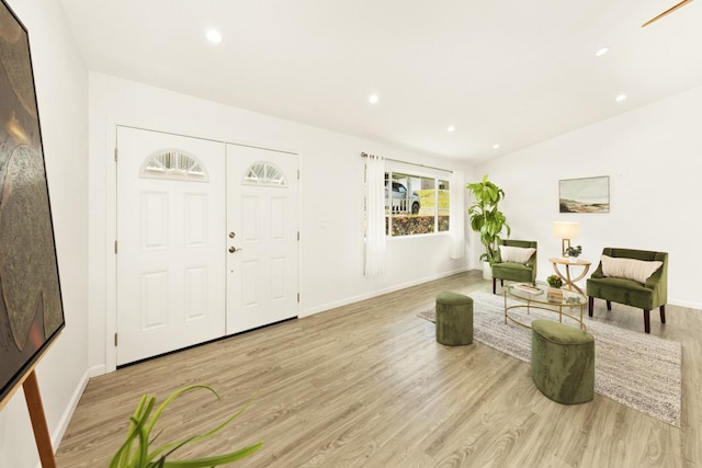 25-228 Hana St, Hilo, HI 96720 - entrance foyer featuring light wood-style floors and recessed lighting