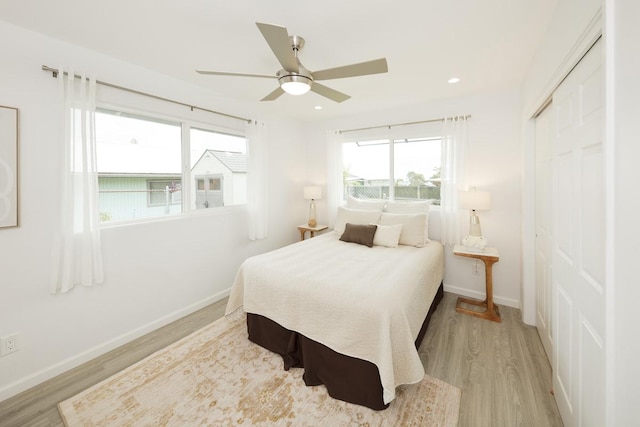 25-228 Hana St, Hilo, HI 96720 - bedroom featuring wood finished floors, a closet, recessed lighting, and a ceiling fan