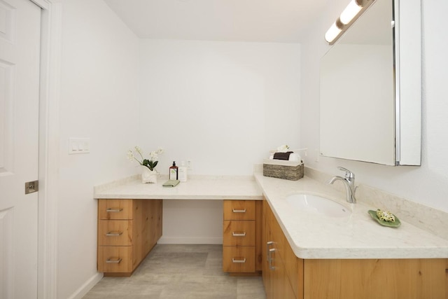 25-228 Hana St, Hilo, HI 96720 - bathroom with vanity and baseboards
