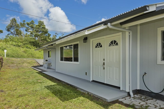 25-228 Hana St, Hilo, HI 96720 - doorway to property with a lawn