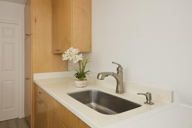 25-228 Hana St, Hilo, HI 96720 - kitchen featuring light countertops and brown cabinetry