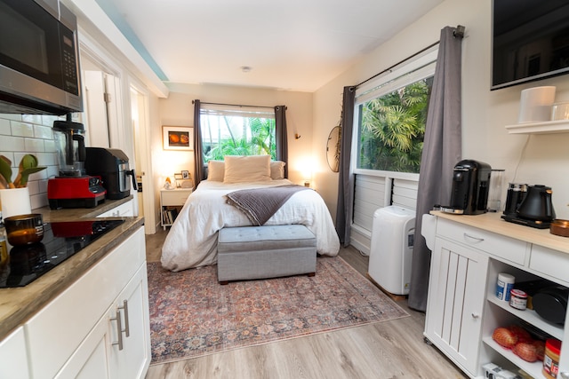 77-6452 Leilani St, Kailua-Kona, HI 96740 - bedroom featuring light wood-style flooring