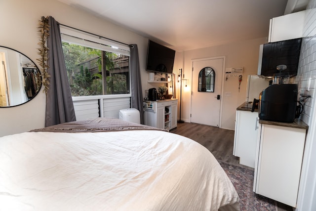 77-6452 Leilani St, Kailua-Kona, HI 96740 - bedroom with dark wood-type flooring
